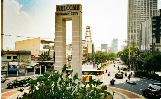 A towering clock in the heart of a bustling city, marking the passage of time with its grand presence, image